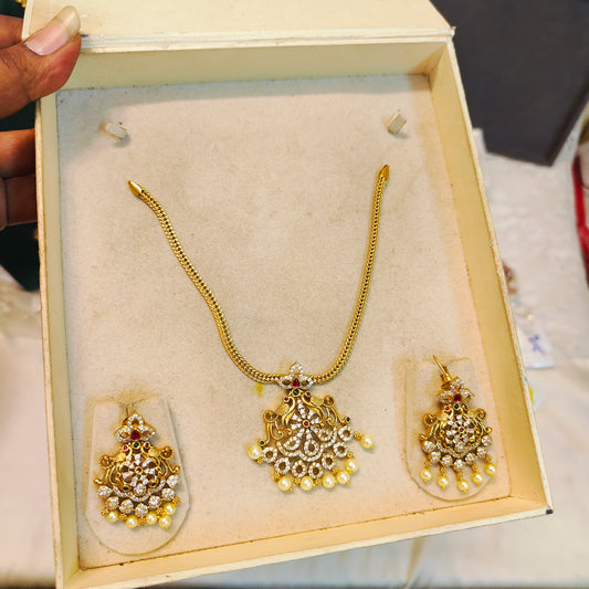 Regal pearl drop gold necklace set