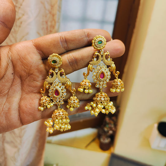 Antique gold jhumka with pearl detailing