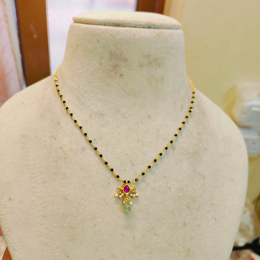 Elegant black beads chain with ruby pendant