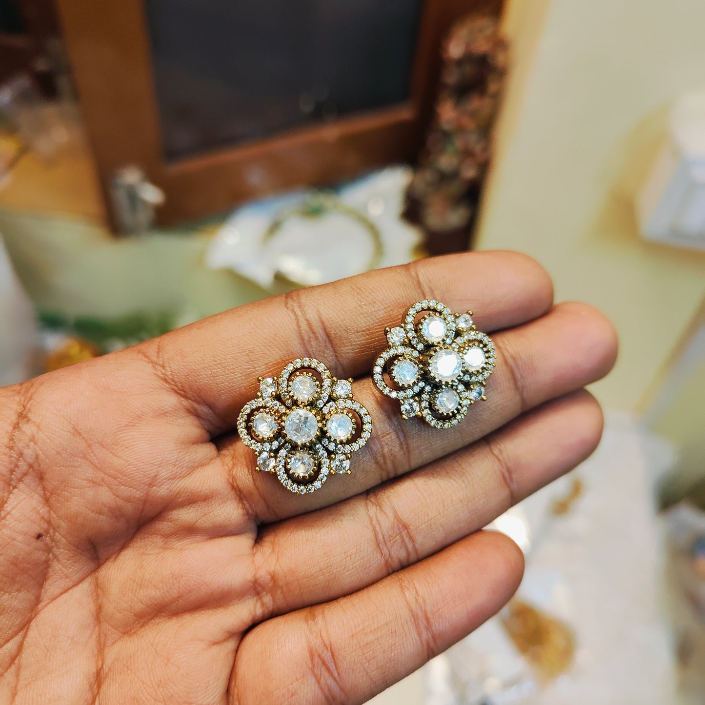 Radiant floral sparkle studs