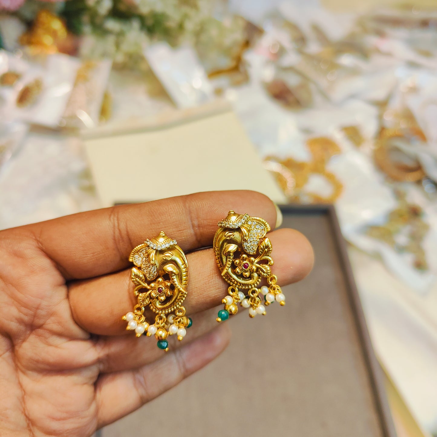 Gold antique finish ganesha earrings