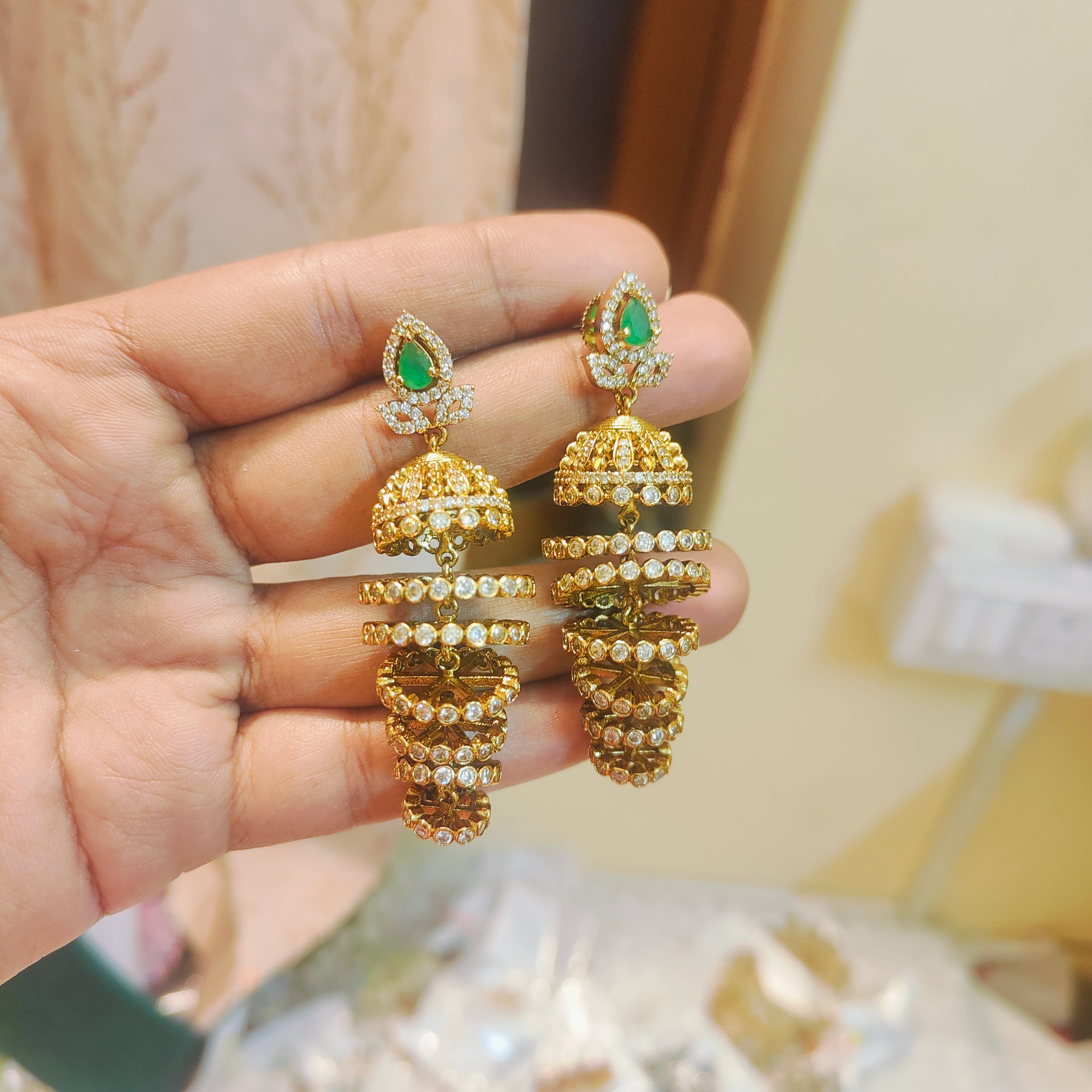 Bridal emerald cz step jhumka