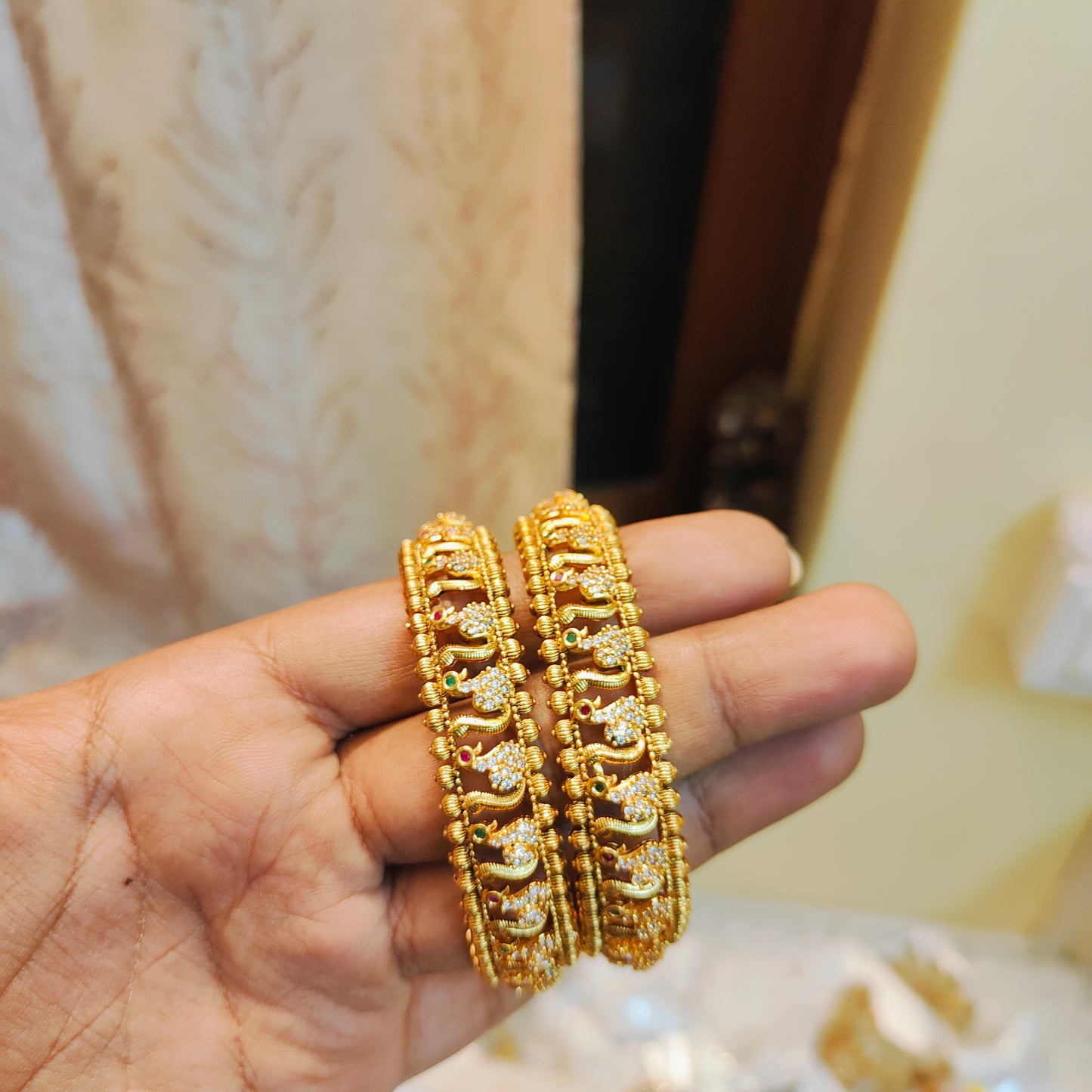 Golden grace peacock bangles