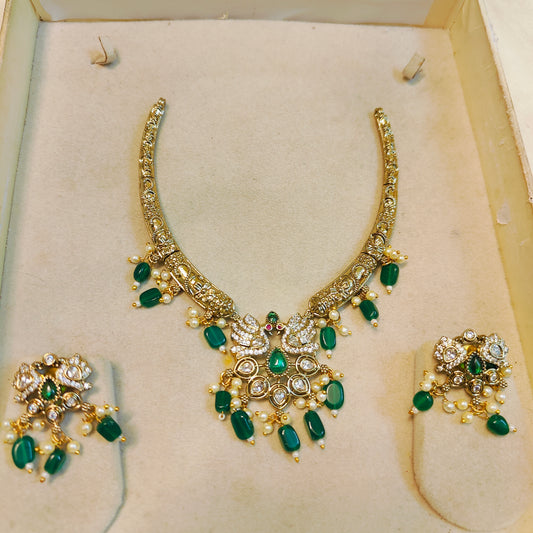 Dual peacock motif cz emerald Kanti necklace set