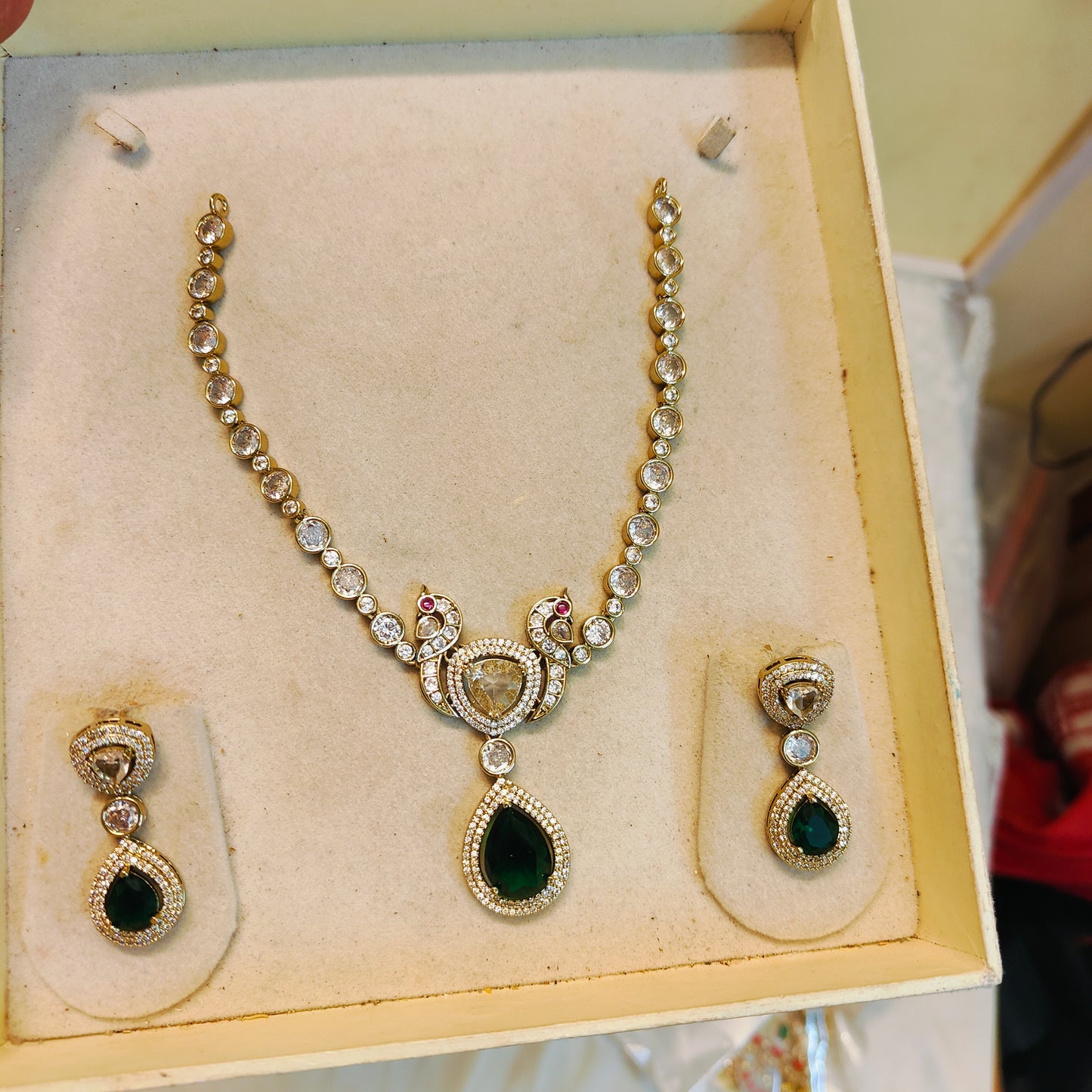 Elegant Moissanite necklace set with green drops and peacock design