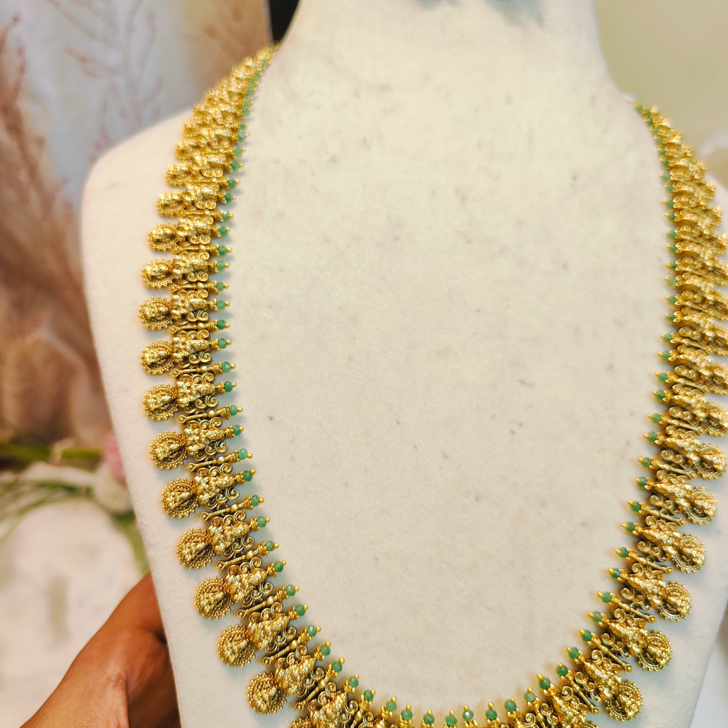Antique lakshmi haram with green beads accents