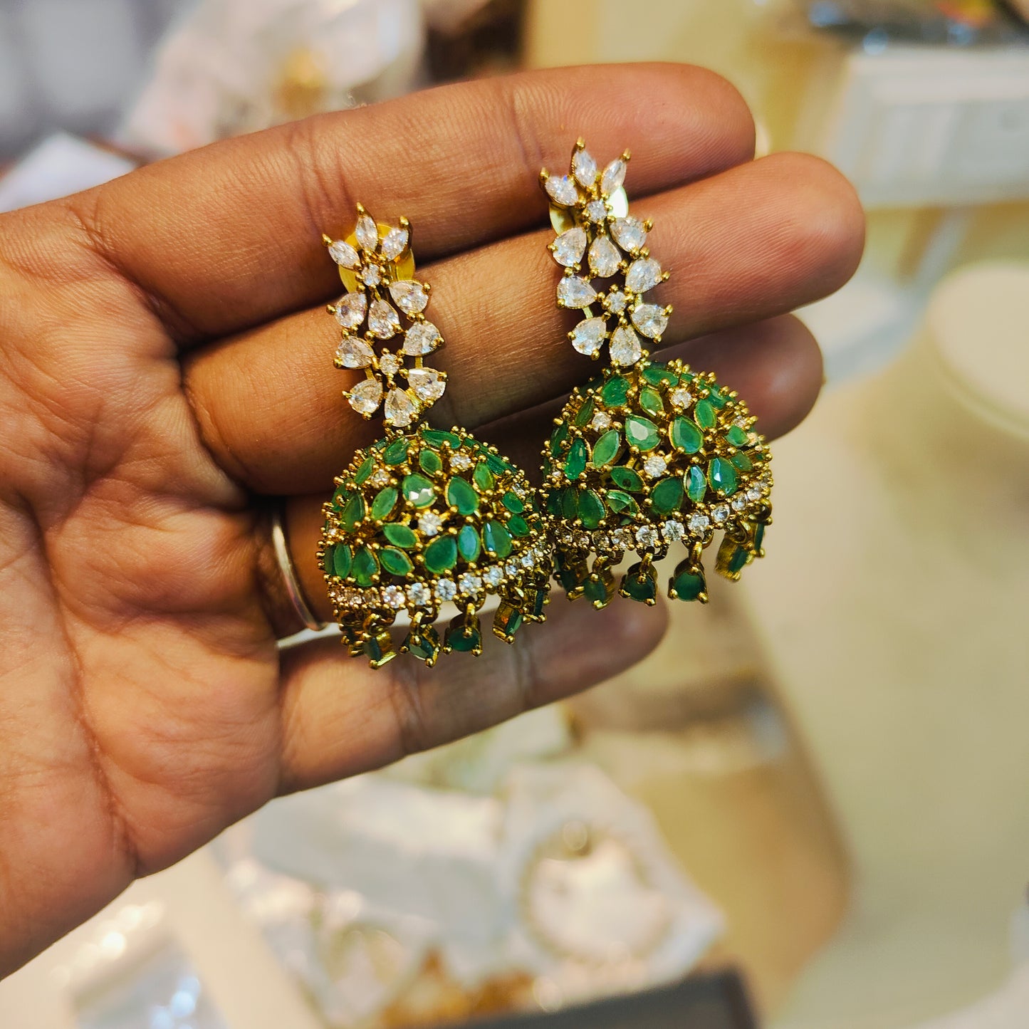 AD stone green jhumka