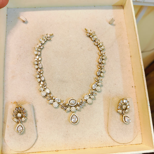 Elegant cz necklace set with floral accents