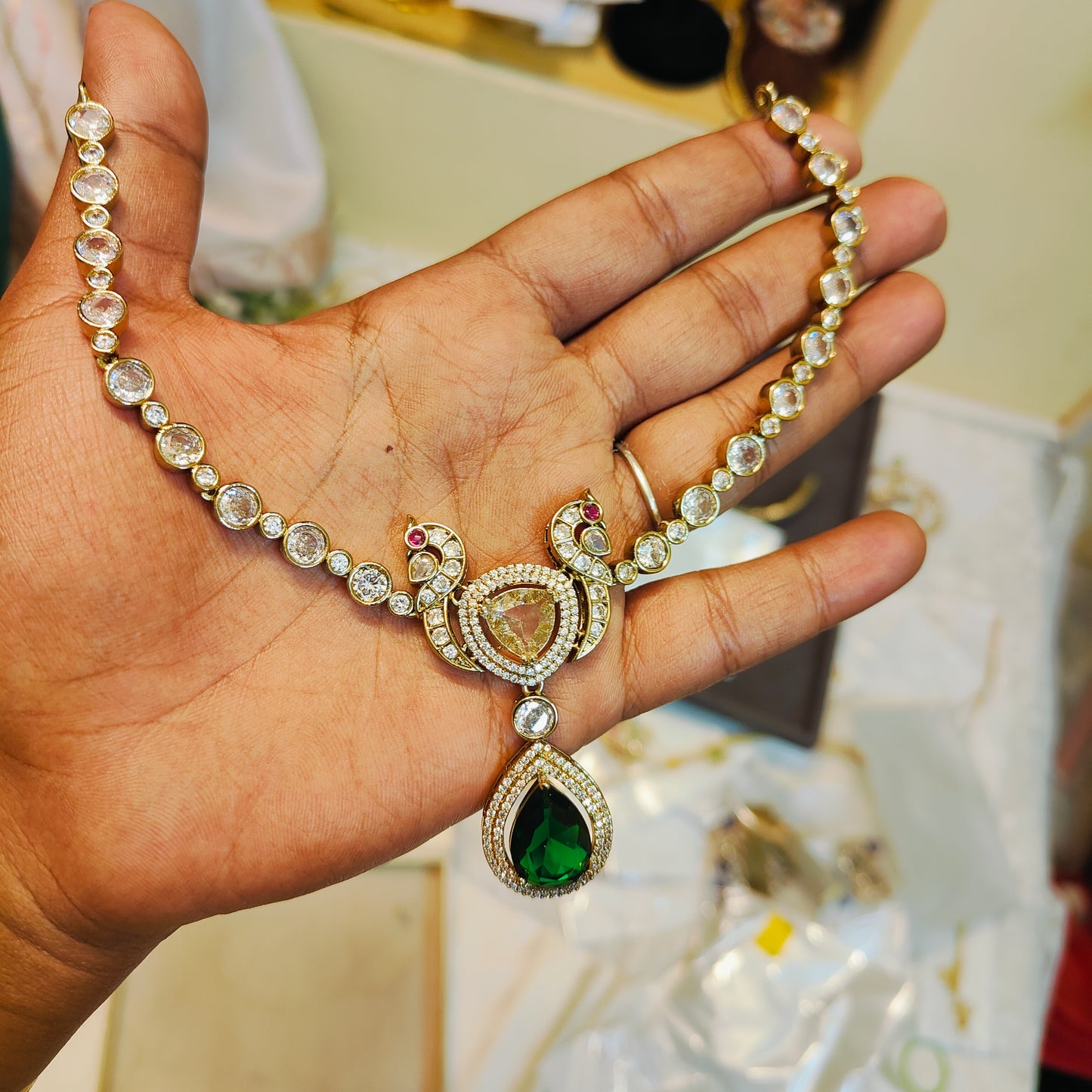 Elegant Moissanite necklace set with green drops and peacock design
