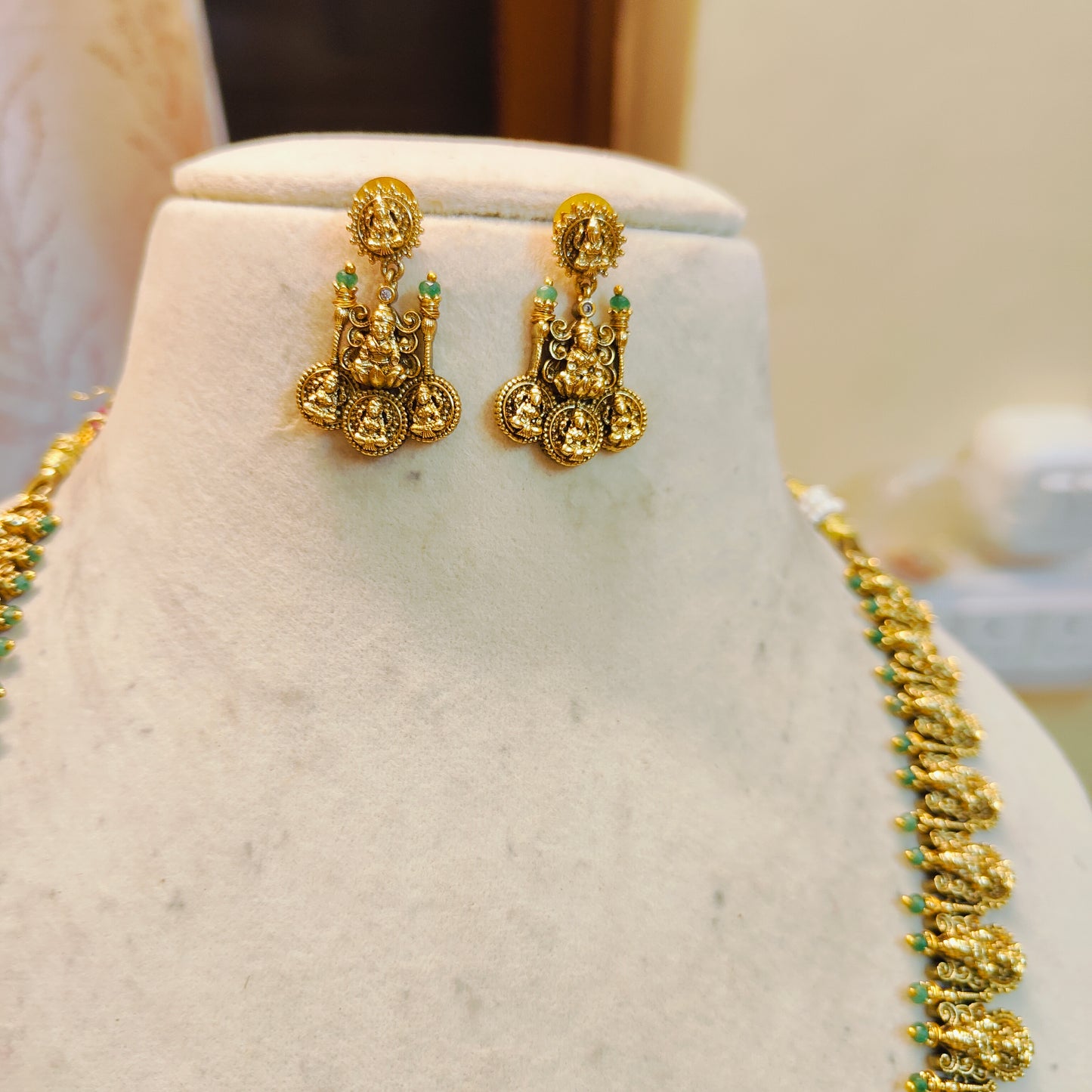 Antique lakshmi haram with green beads accents